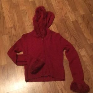 It’s Our Time zip up sweater.